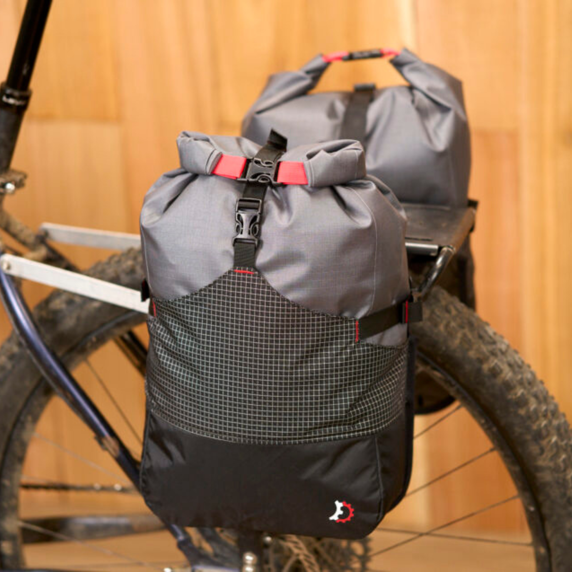 Revelate Designs Portage Panniers installed on a rear rack, back left view