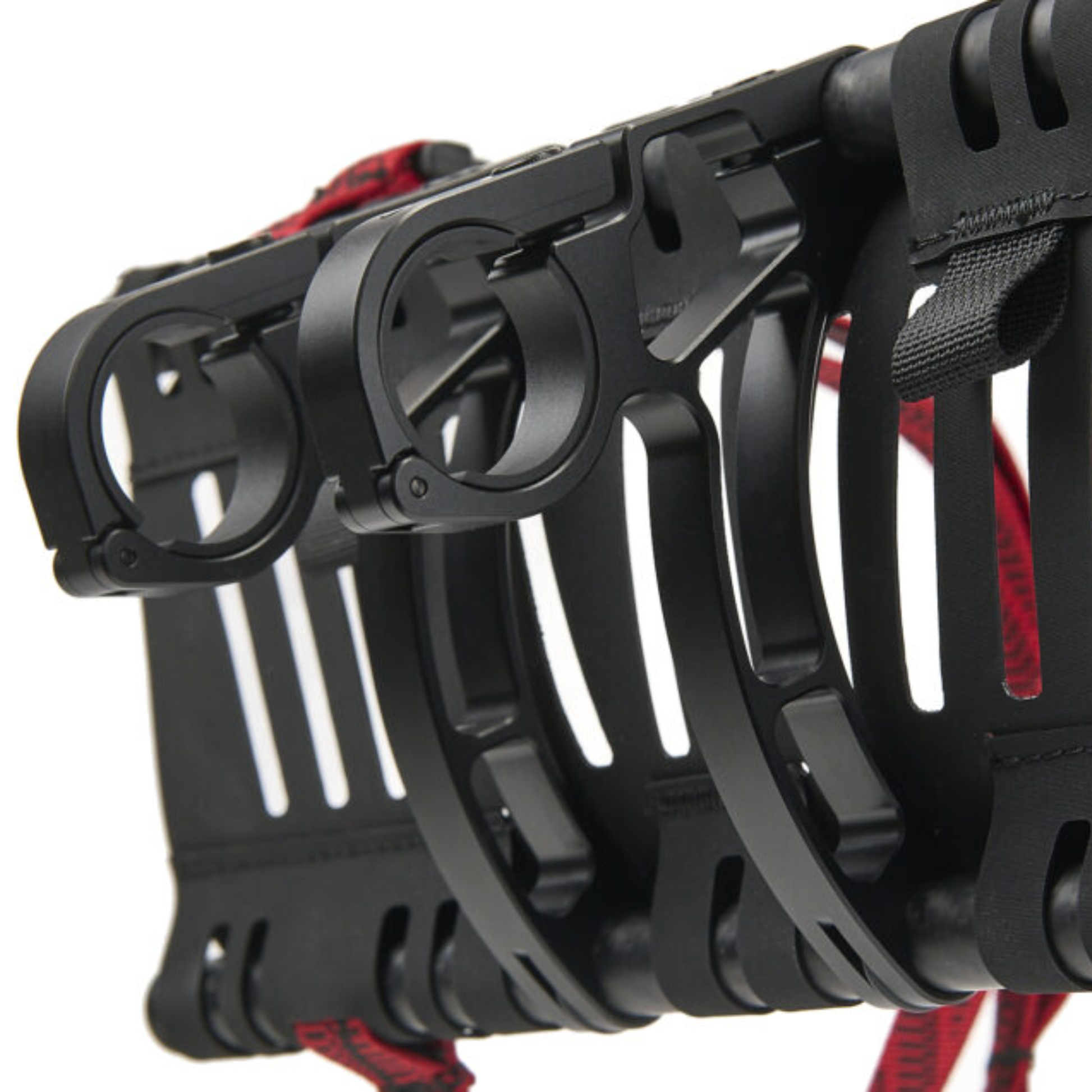 Revelate Designs Hammerhead bikepacking handlebar harness with carbon support tubes, adjustable clamps, Hypalon sling and elevated light and computer mount.