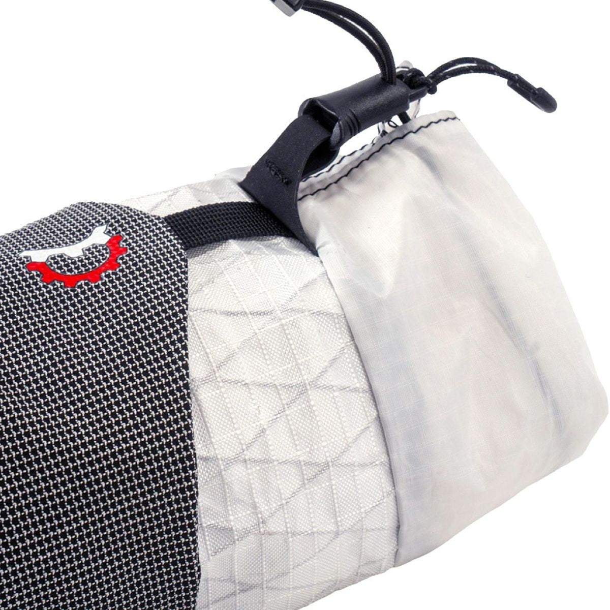 Revelate Designs Speedbag lightweight bikepacking feed bag, with a slim contoured shape, bottle storage and stretch pocket for fast rides and ultra racing