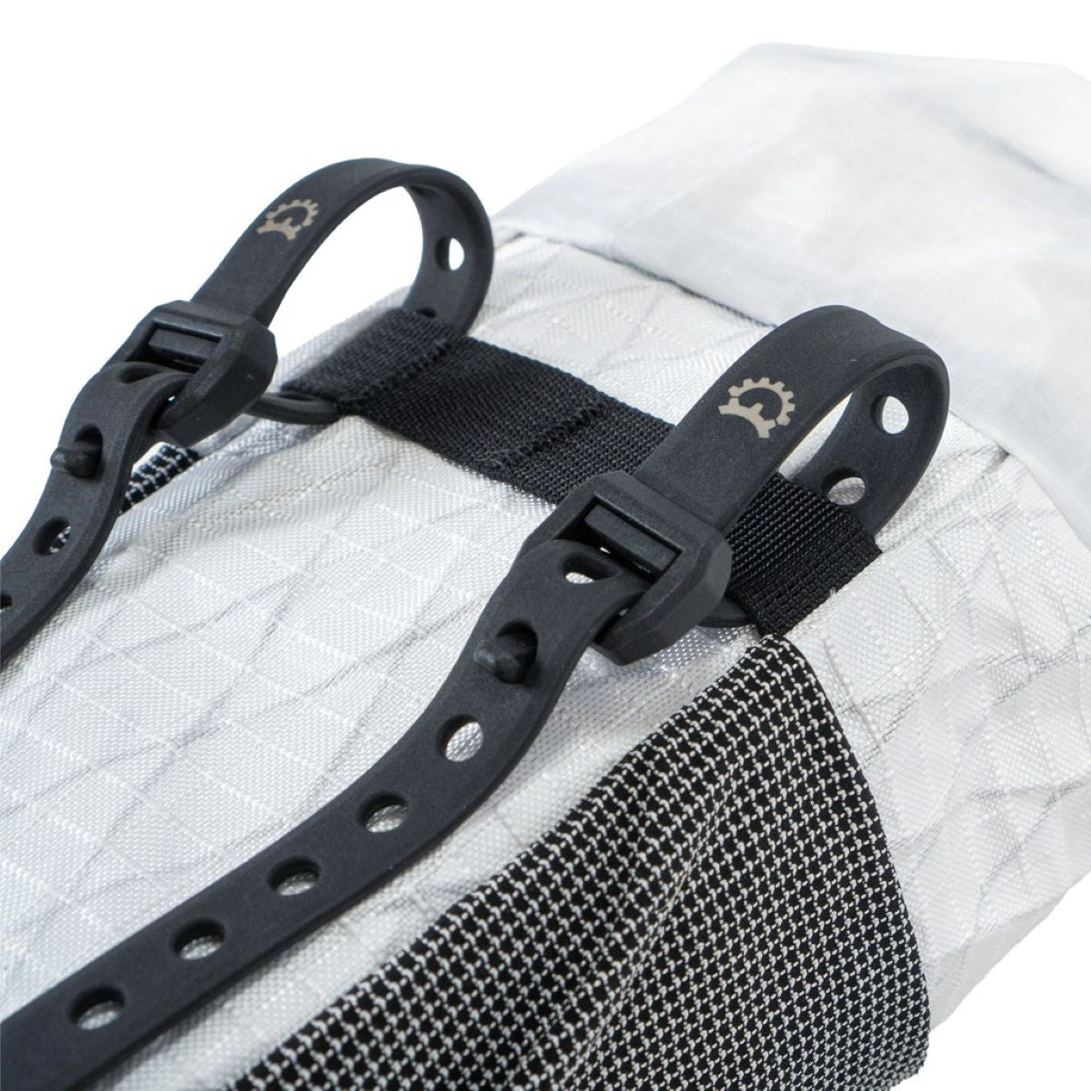 Revelate Designs Speedbag lightweight bikepacking feed bag, with a slim contoured shape, bottle storage and stretch pocket for fast rides and ultra racing