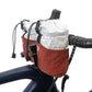 Revelate Designs Speedbag lightweight bikepacking feed bag, with a slim contoured shape, bottle storage and stretch pocket for fast rides and ultra racing