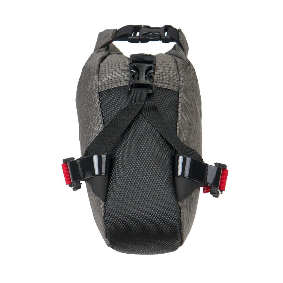 Revelate Designs Ultra Shrew 2.25L seat bag, a lightweight saddle-rail mounted bikepacking bag with roll-top closure for fast, all-terrain rides.