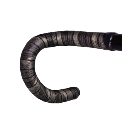 Sim Works BTP woven bar tape in chima black/gold pattern, wrapped on handle bar. 