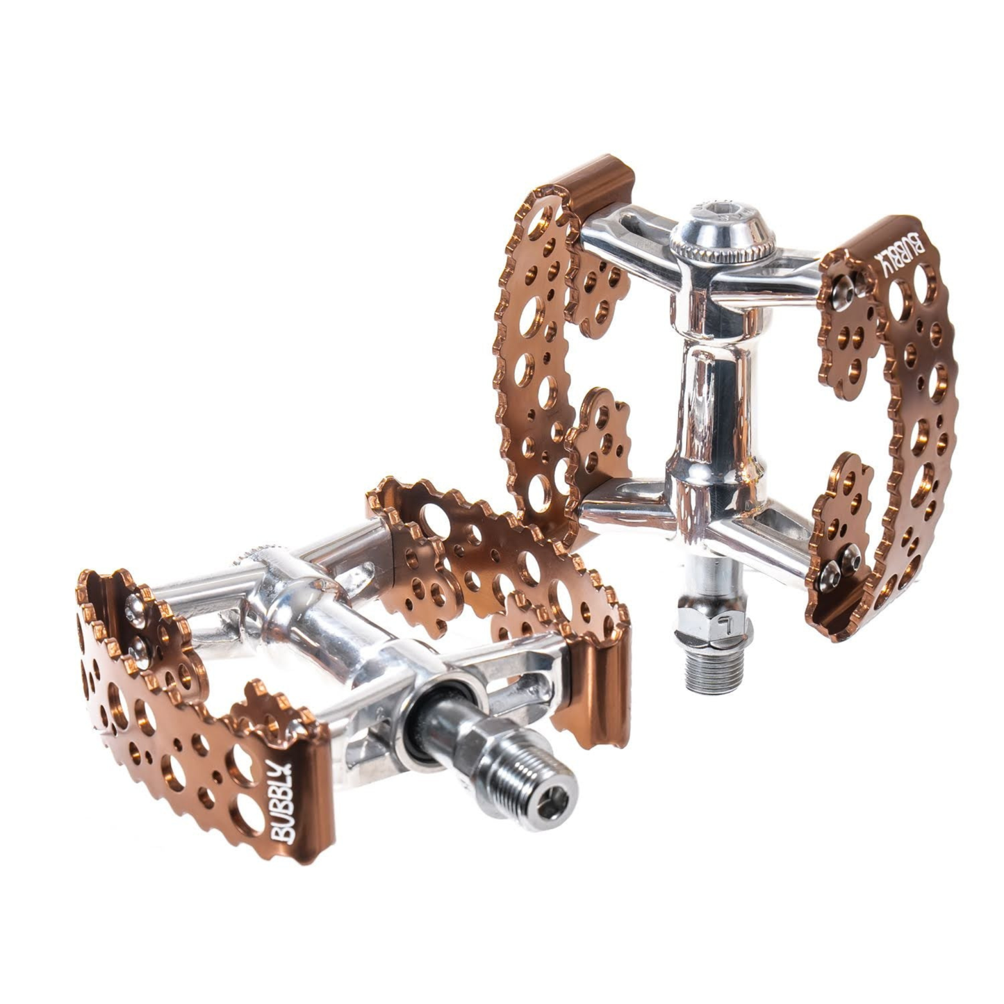 A pair of SimWorks by MKS Tiny Bubbly Bronze Edition compact platform bicycle pedals on a white background