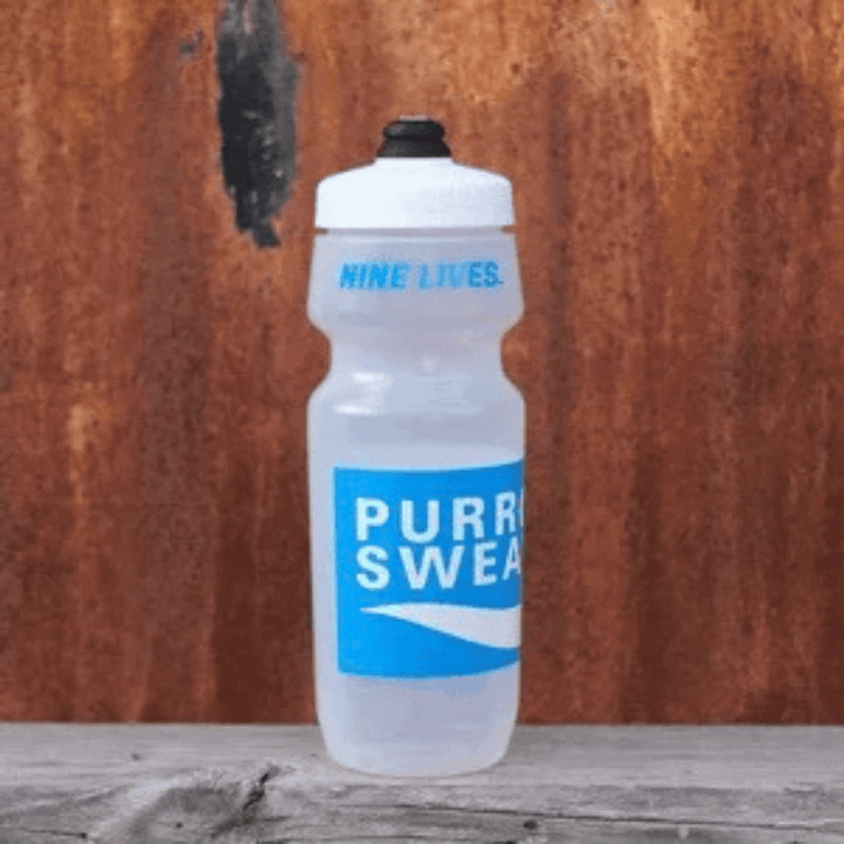 SimWorks Purrcari Sweat 24 oz cycling water bottle with illustrated graphic