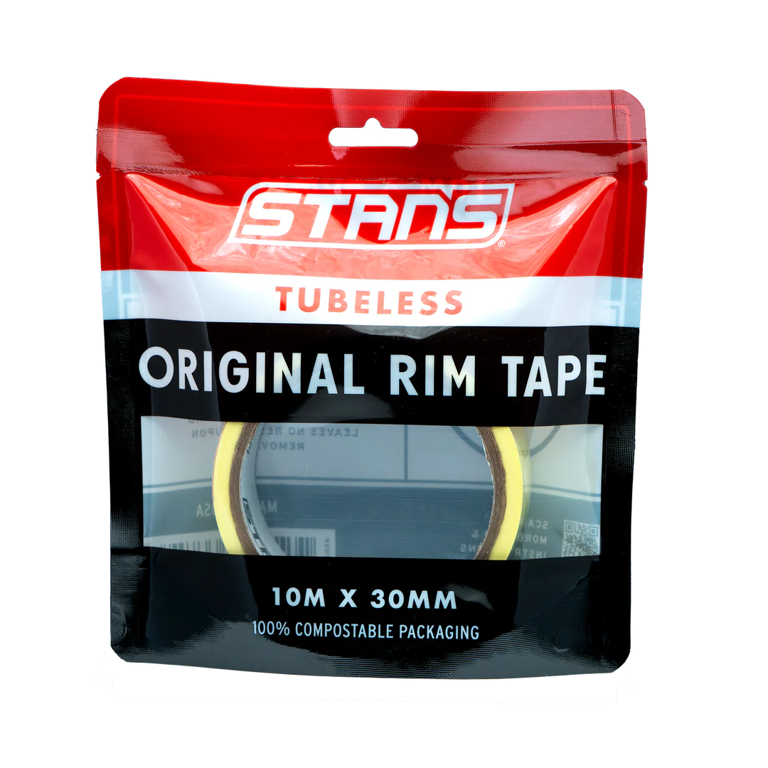 Stan’s Original Tubeless Rim Tape roll inside a plastic back front view
