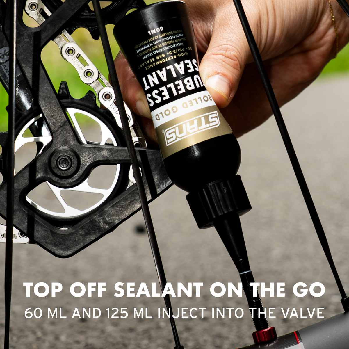 Stan's Rolled Gold Tubeless Tire Sealant for road and gravel tires, featuring a high-pressure natural latex formula for fast puncture sealing.