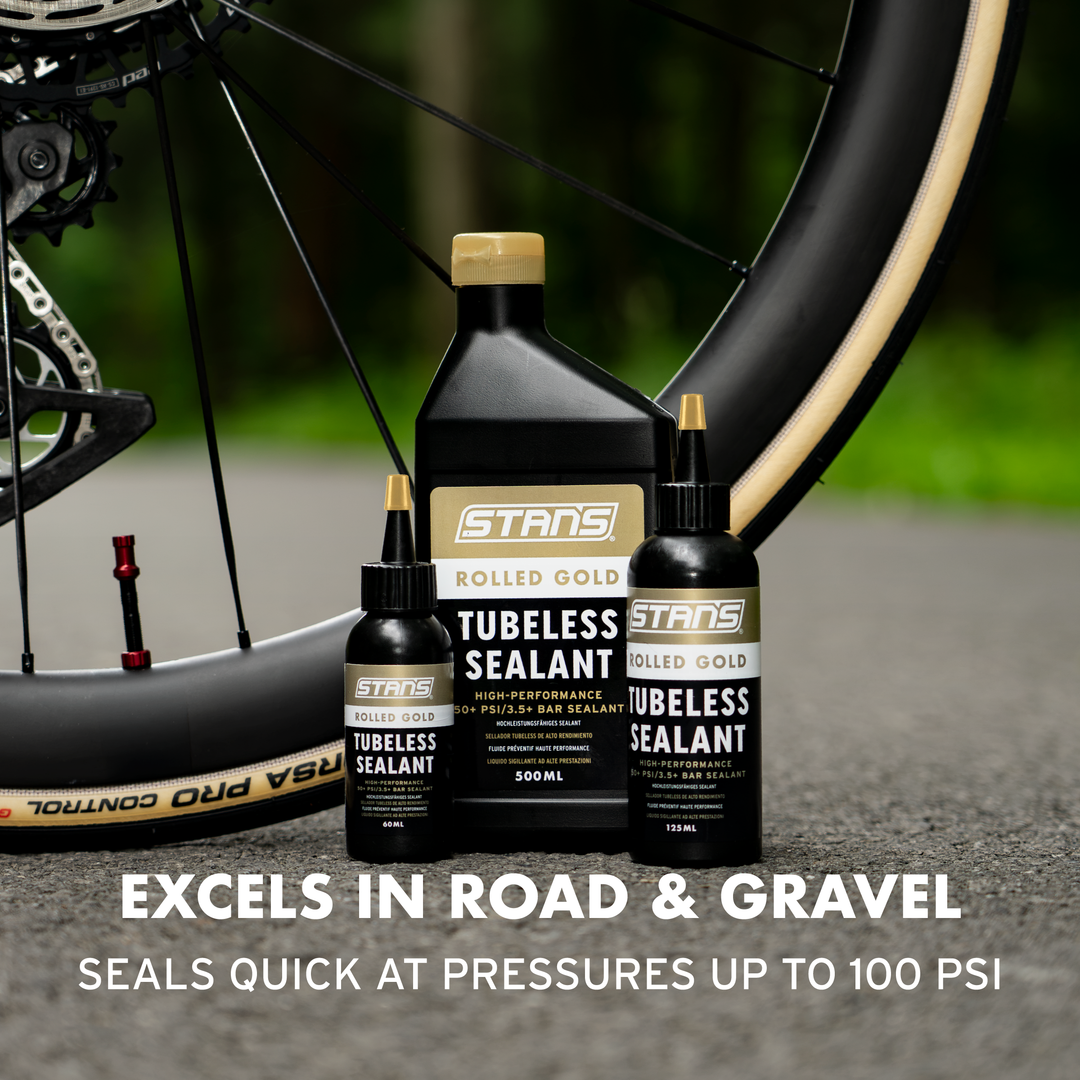 Stan's Rolled Gold Tubeless Tire Sealant for road and gravel tires, featuring a high-pressure natural latex formula for fast puncture sealing.