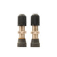 Stan’s tubeless Schrader valve brass standing next to each other