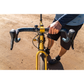 A close-up outdoor shot of a cyclist's hand gripping the Teravail Radia 12 SE flared aluminum drop handlebar 