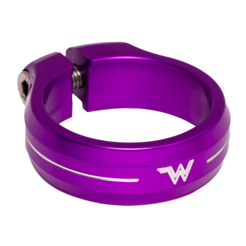 White Industries CNC-machined aluminum seat collar in purple anodized colour on white background.
