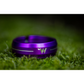 White Industries CNC-machined aluminum seat collar in purple anodized colour on green background