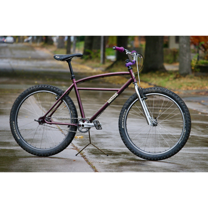 Wilde Moto Cruiser steel frameset with matching fork and Moto Cruiser handlebar
assembled with city street background