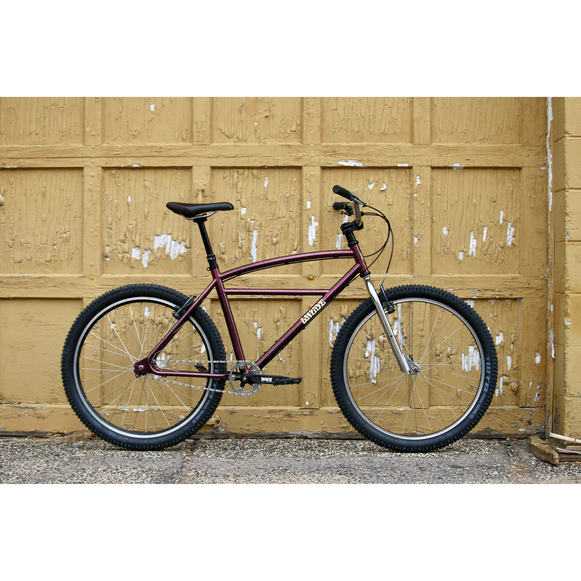 Wilde Moto Cruiser steel frameset with matching fork and Moto Cruiser handlebar
assembled in front of garage door