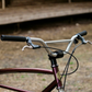Wilde Moto Cruiser Bar in polished chromoly steel, bringing an upright riding position with a 90mm rise, 15° backsweep and plenty of leverage for cruising or trail rides.