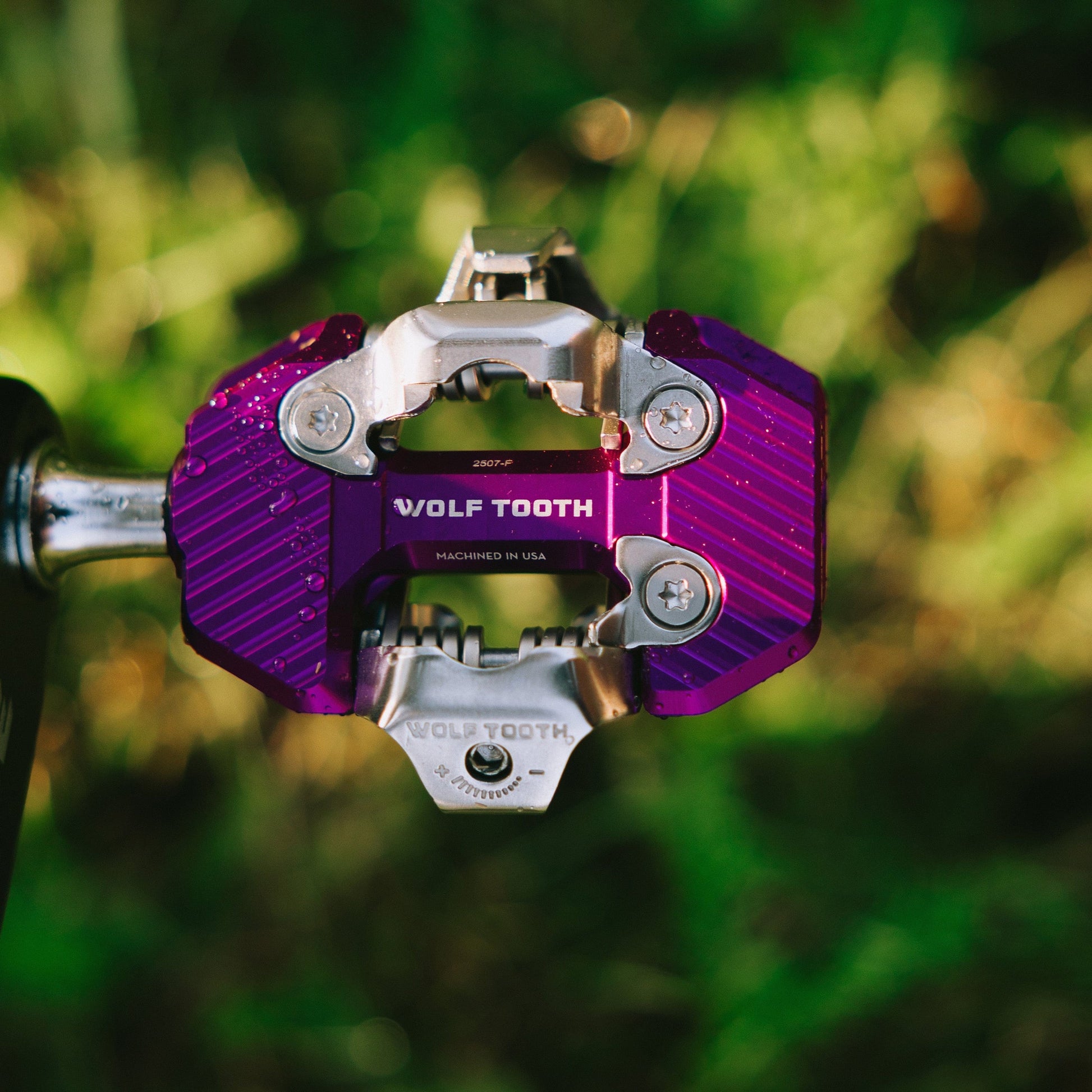 Wolf Tooth CTRL Trail clipless pedal ultraviolet purple installed on a bike